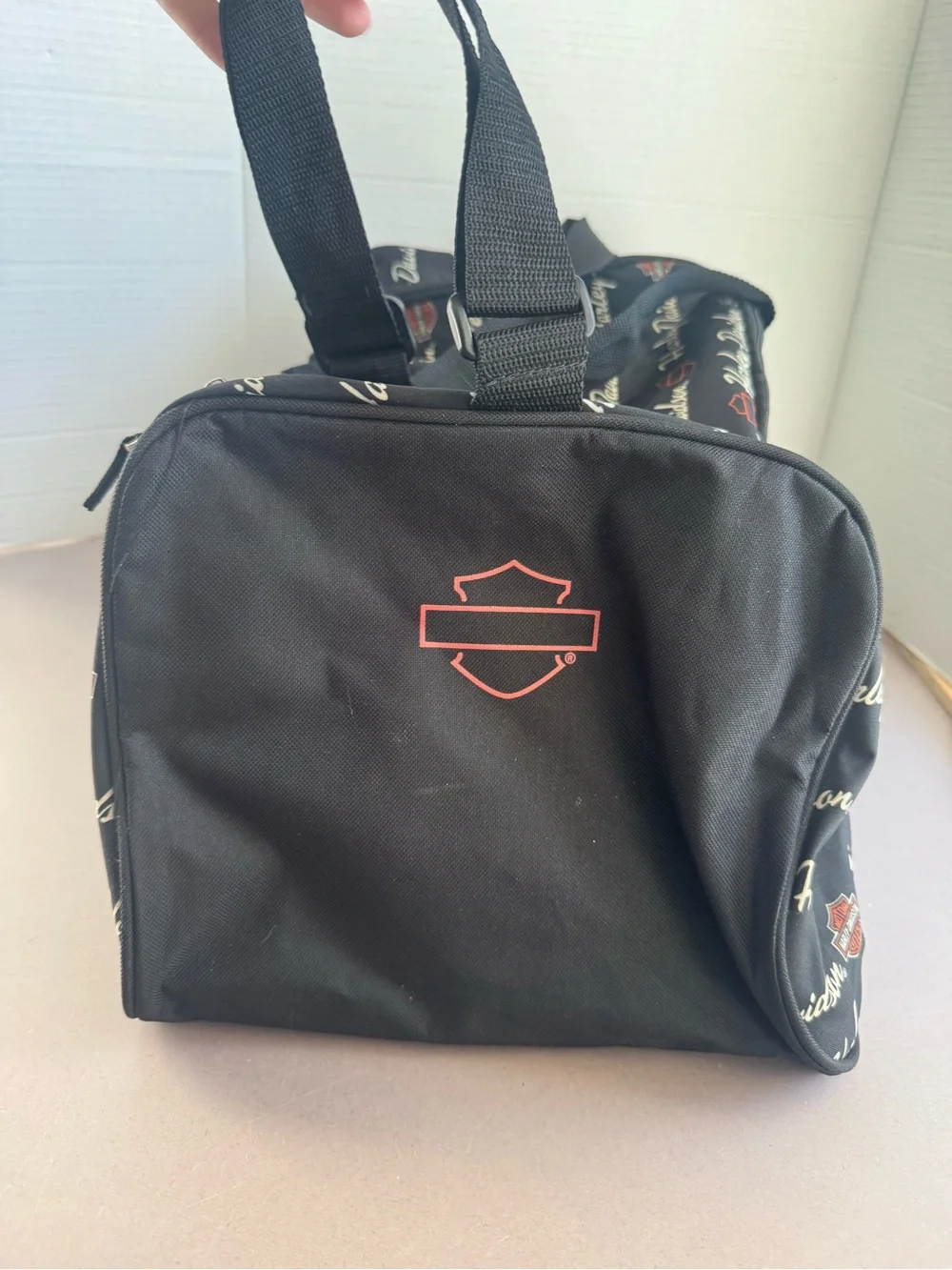 Harley-Davidson Black Duffel with White Script and Orange Accents